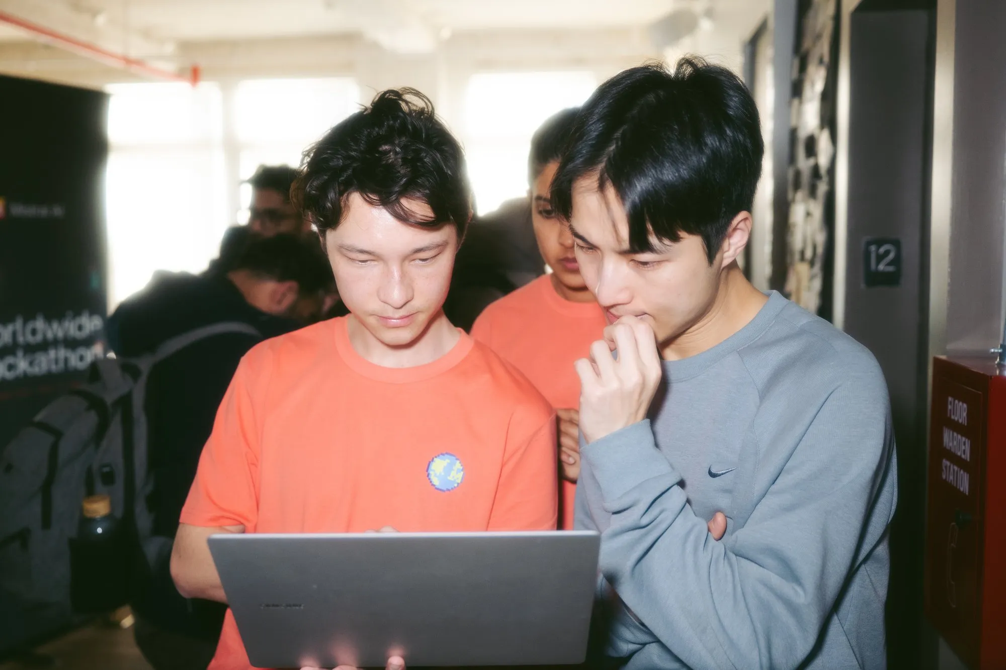 Volunteers reviewing submissions
