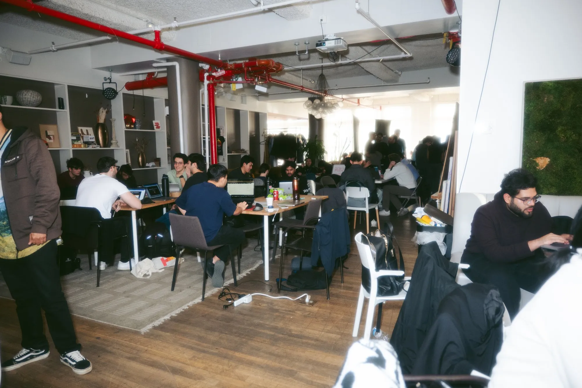 Wide view of overnight hackathon hall