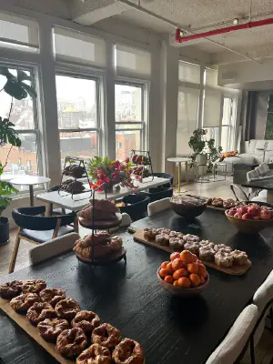 Day 1 breakfast: French croissants, pastries, and fruit — 'France' was the first meal.