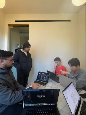 Five minutes on the clock — a team presents their demo to the judging panel.